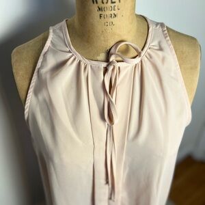 Monteau pale peach sleeveless blouse with tie top
Large NWT